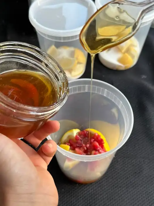 Lemonade Being Made with Honey instead of Sugar.